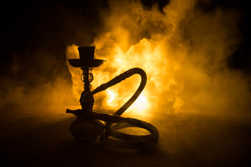 Hookah hot coals on shisha bowl with black background. Stylish oriental shisha. Shisha Concept