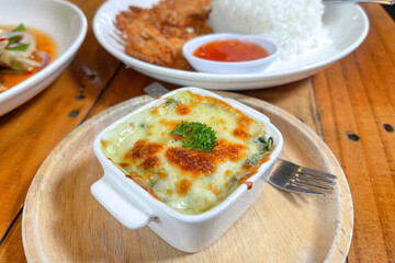 Pak Khom Ob Cheese. Baked Spinach with Cheese.
