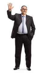 Full length portrait of a mature businessman waving hello