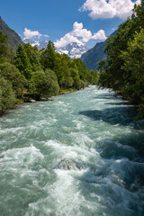 Ecrins National Park: The Severaisse river in Summer with the Jocelme Peak in the distance....