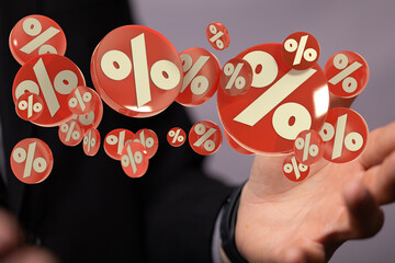 sale digital percent in hand.