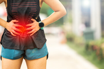 Abdominal pain of a young runner woman. Stomach aches Menstrual pain of women. Jogging woman with...