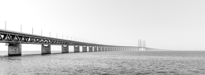 black and white panorama view of the Oresund Bridge between Denmark and Sweden