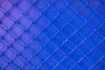 abstract surface from painted mesh netting