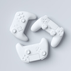 Set of lying gamer joysticks or gamepads on white background
