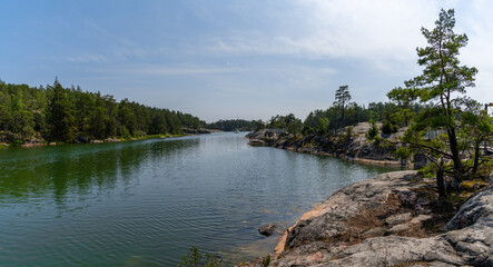 beautful archipelago with islands and forest landscape on the ocean coast on a summer day