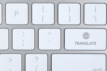 Modern computer keyboard with button for quick translation, top view