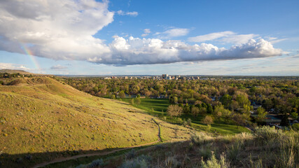 Boise Idaho neighborhood skyline after rain in Spring. View from Camels Back Park. 
