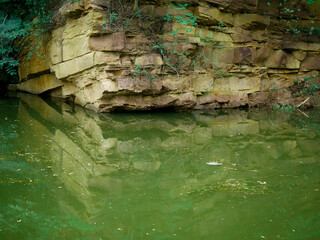 Fototapeta premium Rock stone mountain presented with water reflection image.
