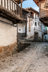 Fototapeta na wymiar street in typical Spanish town with very old houses in the town of Valverde de la Vera in Caceres in Spain