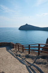 stairs with railings in the mountains, wild landscape, trail to the mountains, tourist route