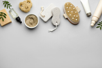 Flat lay composition with pumice stones on light grey background. Space for text