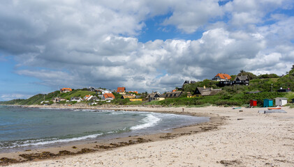 the quaint holiday village of Tisvildeleje and sandy beach on the coast of northern Zealand in...