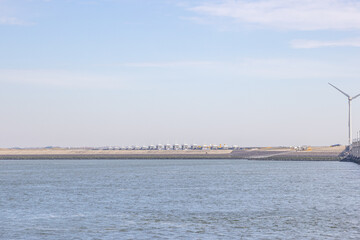 Rhine-Meuse-Scheldt delta with of the Delta Works in the back ground. Dams, sluices, locks, dykes, levees, and storm surge barriers. Environmental engineering in South Holland and Zeeland, Netherlands