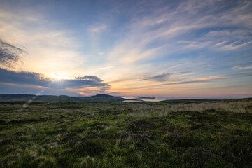 A stunning sunset on the Isle of Skye in the Scottish Highlands, UK