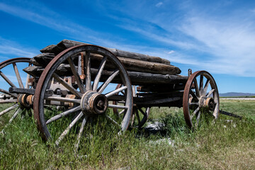 Old wagon loaded with railroad ties