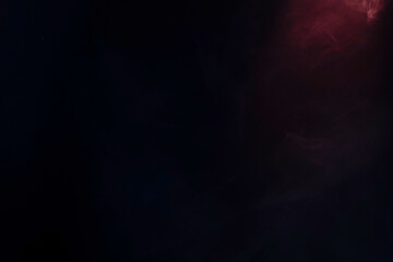 Blue and pink steam on a black background.