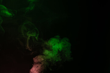 Green and pink steam on a black background.
