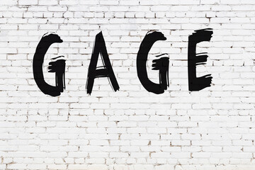 Inscription gage painted on white brick wall © iushakovsky