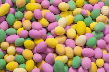 Group of colorful peanuts in glaze.