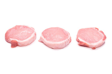 Raw pork pieces isolated on a white background.