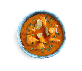 Bowl of delicious chicken curry on white background, top view