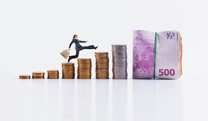 job career concept - woman manages to jump to the top of the money-earner
