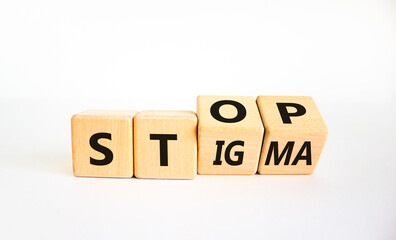 Stop stigma symbol. Turned wooden cubes with words stop stigma. Beautiful white background. Medical...