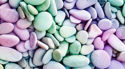 Colorful pebbles background, decorative turquoise lilac color design