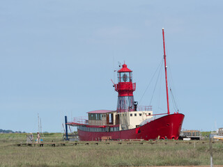 ollesbury Lightship .Red vessel set in marshland in Essex ,uUK