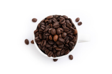 Coffee mug fulled of coffee beans isolated
