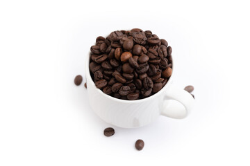 Coffee mug fulled of coffee beans isolated