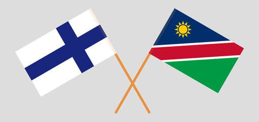 Crossed flags of Finland and Namibia. Official colors. Correct proportion