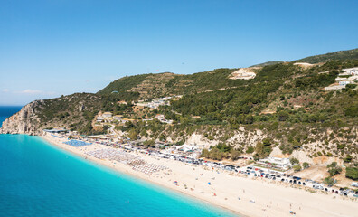 Fototapeta na wymiar Drone view of scenic beach with white sand and turquoise sea, Greek islands.