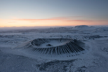 Hverfjall volcano crater from aerial view at sunrise © Cavan