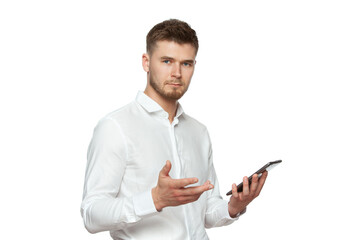 Portrait of a young man in a white shirt with a tablet in his hands. The figure is isolated on a white background.