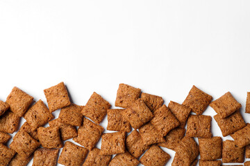 Delicious chocolate corn pads on white background, top view