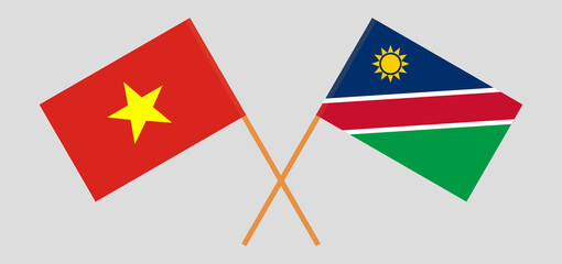 Crossed flags of Vietnam and Namibia. Official colors. Correct proportion