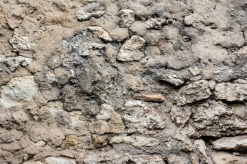 Naklejka premium Texture photo of old stone and concrete wall backdrop.