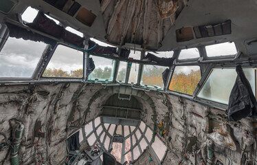 Damaged cockpit of an abandoned cargo plane