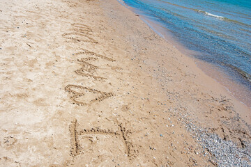 I Love My Dad Written in Sand at Beach Shoreline