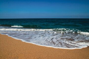 Fototapeta na wymiar Nice landscape on the seashore with blue sky.