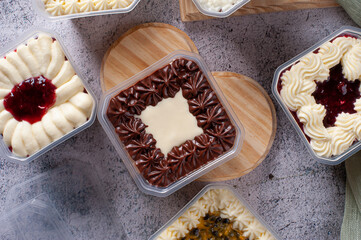 Variety of cake in the pot for delivery. Strawberry, passion fruit, chocolate and coconut flavor....