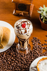 Delicious Chocolate Milk Shake Creamy with chantilly and cherry on top
