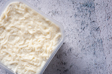 Coconut cake in the pot for delivery. Top view. Copy space.