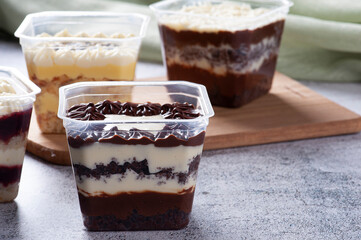 Variety of cake in the pot for delivery. Strawberry, passion fruit, chocolate and coconut flavor....