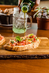 Delicious Bruschetta Toast Cheese Tomato Basil on a Rustic Wooden Plate Baker Artisan Pomodoro