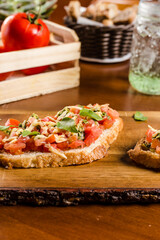 Delicious Bruschetta Toast Cheese Tomato Basil on a Rustic Wooden Plate Baker Artisan Pomodoro