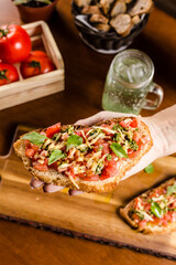 Delicious Bruschetta Toast Cheese Tomato Basil on a Rustic Wooden Plate Baker Artisan Pomodoro