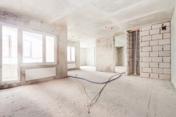 Construction site residential apartment building interior in concrete progress
